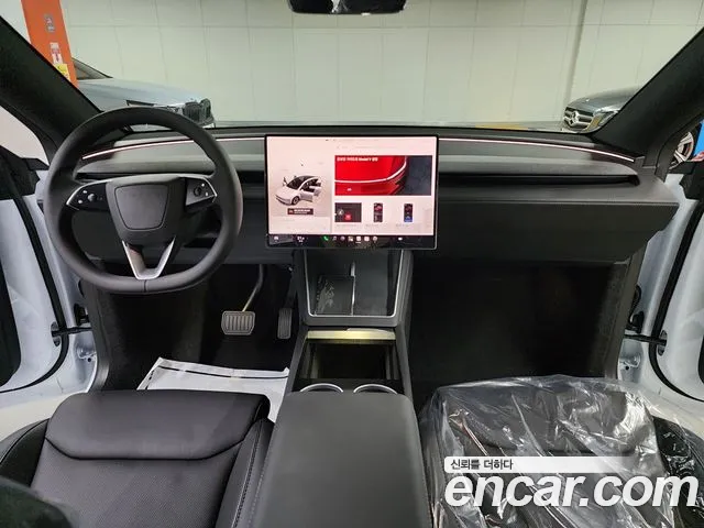 Tesla Model Y — Фото автомобиля 6