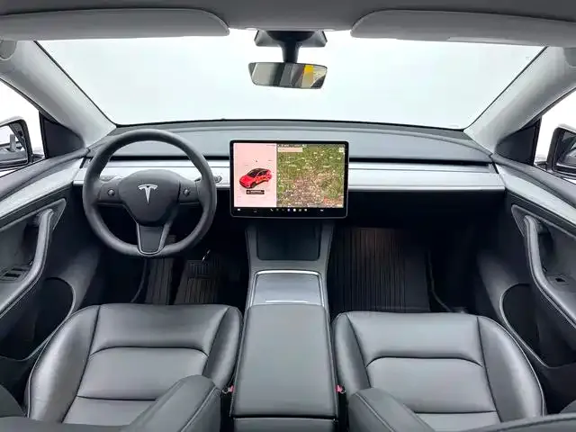 Tesla Model Y — Фото автомобиля 8