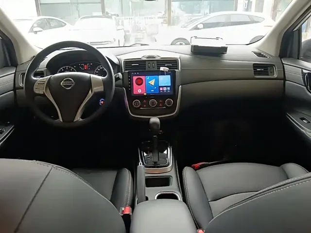 Nissan Tiida — Фото автомобиля 9