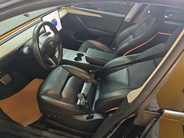 Tesla Model Y — Фото автомобиля 14