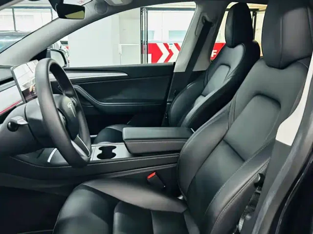 Tesla Model Y — Фото автомобиля 7