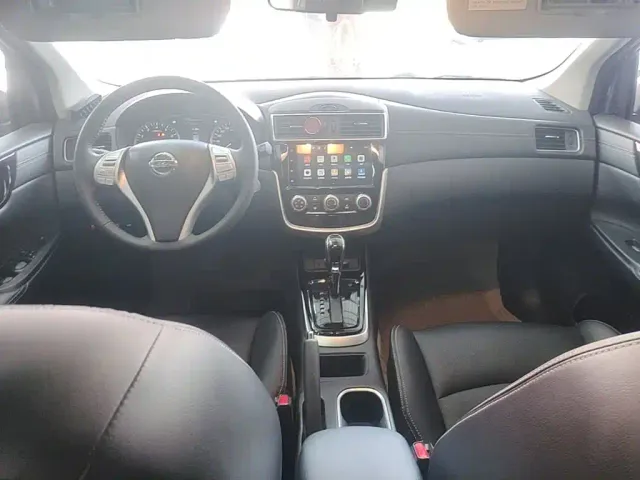 Nissan Tiida — Фото автомобиля 9