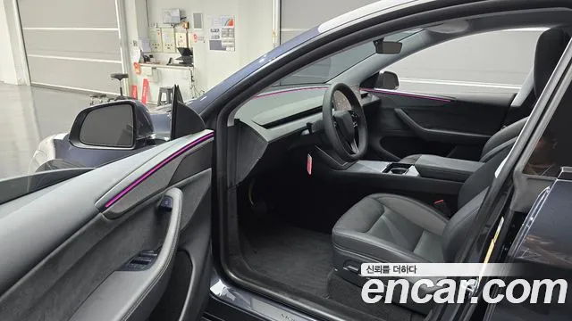 Tesla Model Y — Фото автомобиля 10