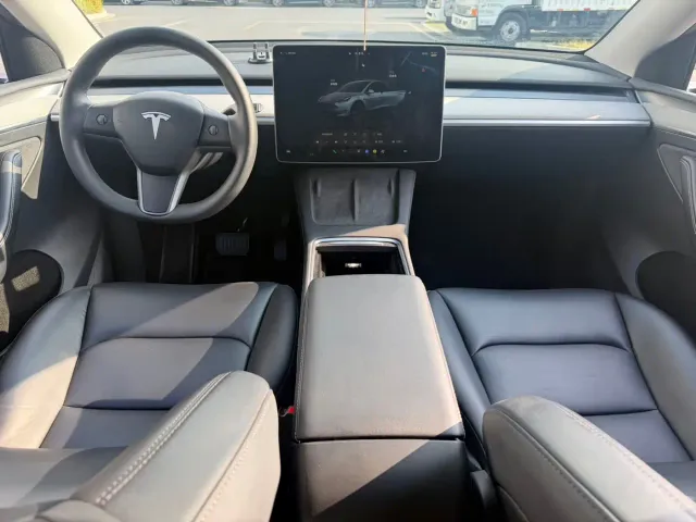 Tesla Model Y — Фото автомобиля 14