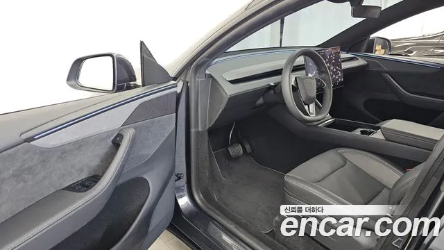 Tesla Model Y — Фото автомобиля 15