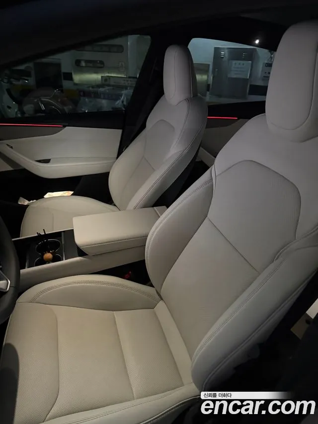 Tesla Model Y — Фото автомобиля 10