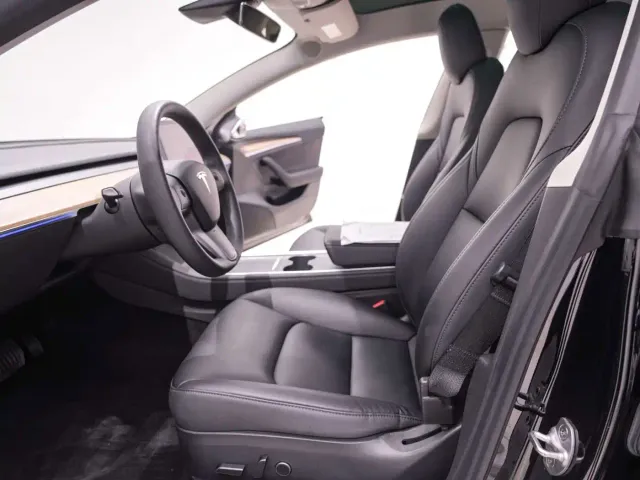Tesla Model 3 — Фото автомобиля 25