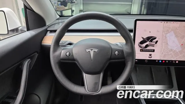 Tesla Model Y — Фото автомобиля 19