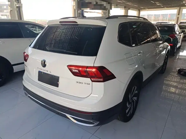 Volkswagen Tiguan L — Фото автомобиля 6