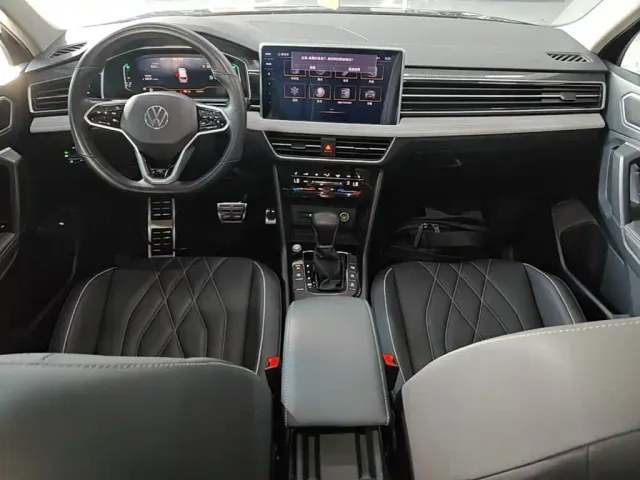 Volkswagen Tiguan L — Фото автомобиля 9