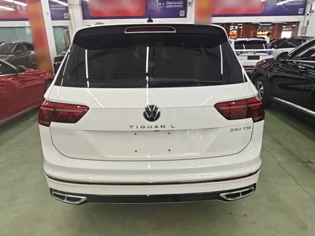 Volkswagen Tiguan L — Фото автомобиля 5