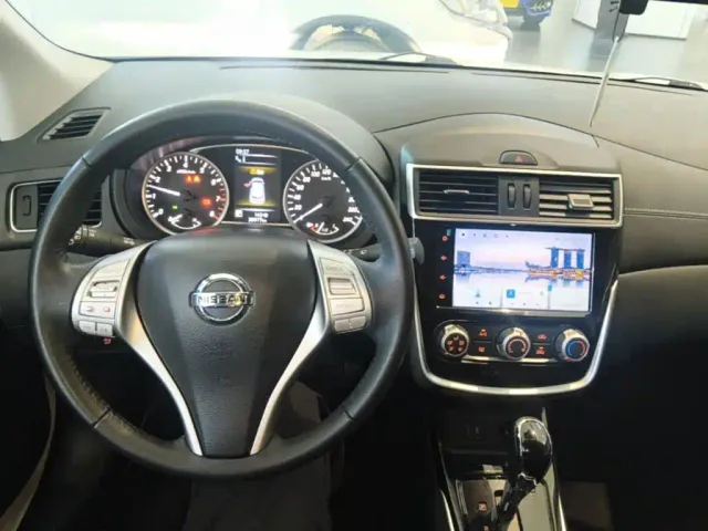 Nissan Tiida — Фото автомобиля 9
