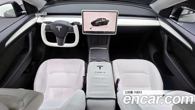 Tesla Model Y — Фото автомобиля 7