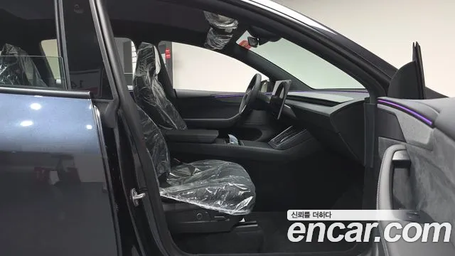 Tesla Model Y — Фото автомобиля 16