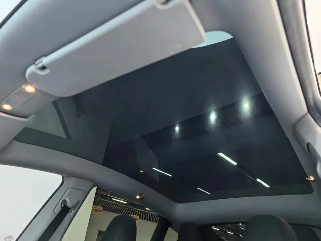 Tesla Model Y — Фото автомобиля 16
