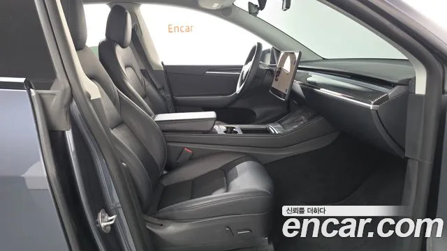 Tesla Model Y — Фото автомобиля 16