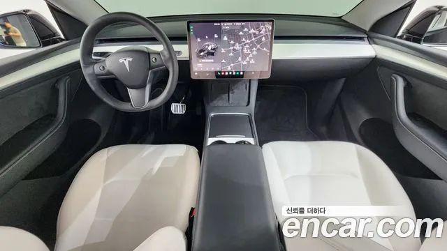 Tesla Model Y — Фото автомобиля 10
