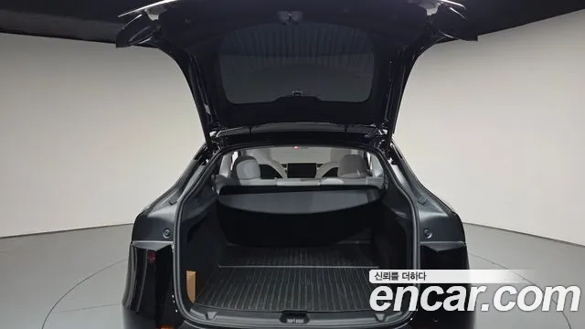 Tesla Model Y — Фото автомобиля 25