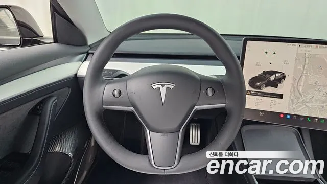 Tesla Model 3 — Фото автомобиля 20