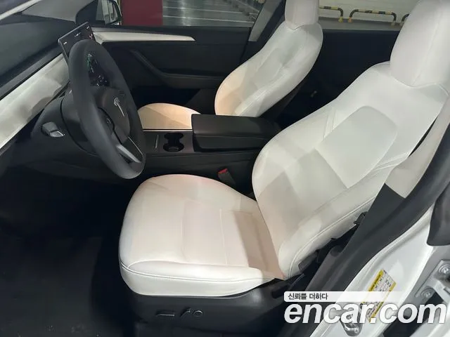 Tesla Model Y — Фото автомобиля 7