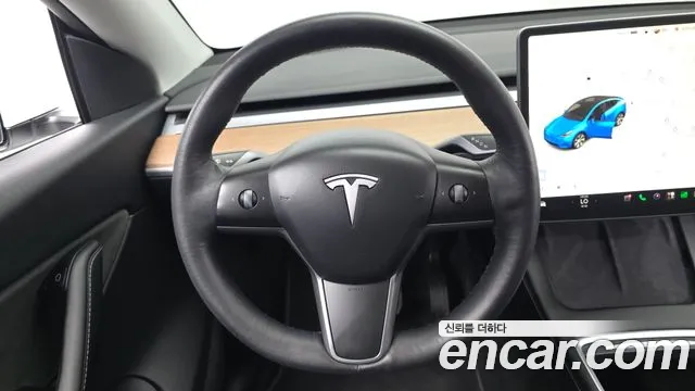 Tesla Model Y — Фото автомобиля 12