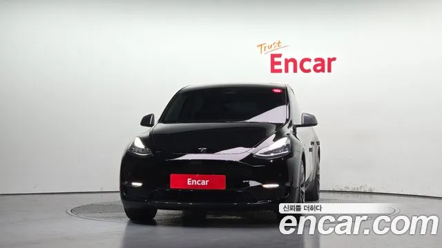 Tesla Model Y — Фото автомобиля 3
