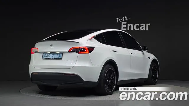 Tesla Model Y — Фото автомобиля 2