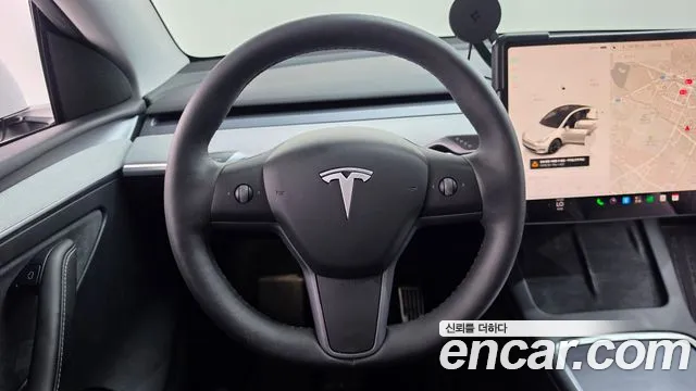 Tesla Model Y — Фото автомобиля 14