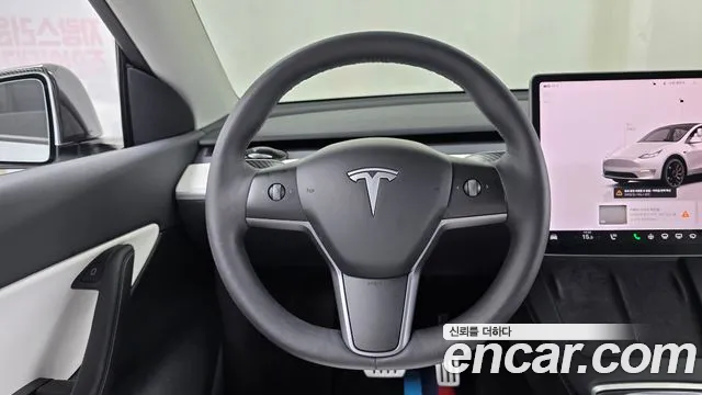 Tesla Model Y — Фото автомобиля 10