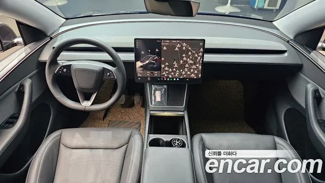 Tesla Model Y — Фото автомобиля 7