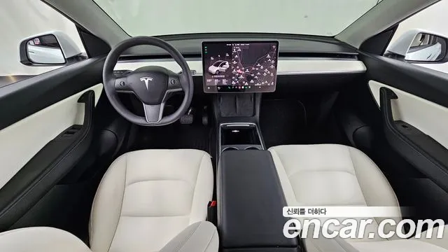 Tesla Model Y — Фото автомобиля 7