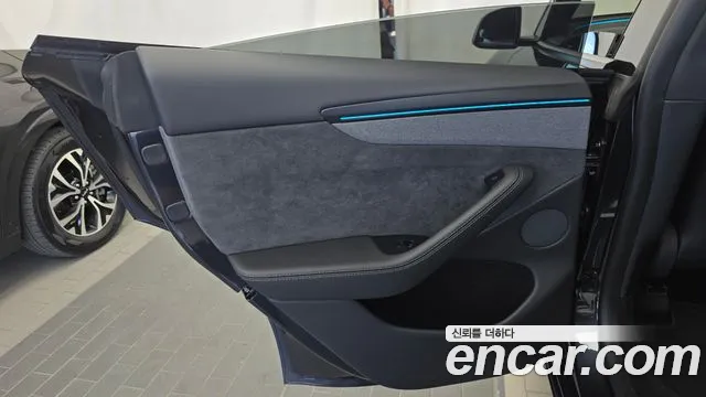 Tesla Model Y — Фото автомобиля 14
