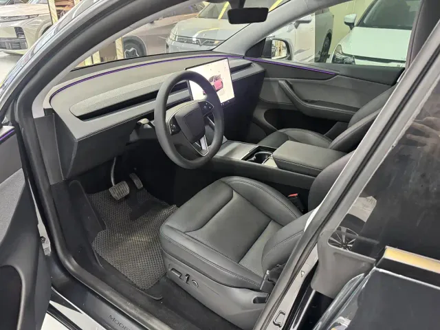 Tesla Model Y — Фото автомобиля 4