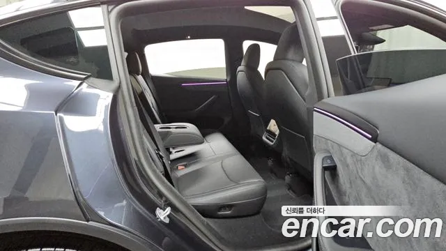Tesla Model Y — Фото автомобиля 11