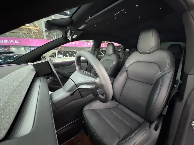 Tesla Model Y — Фото автомобиля 12