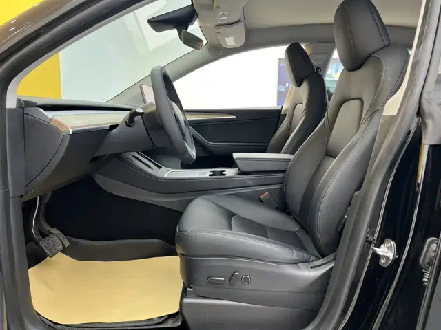 Tesla Model Y — Фото автомобиля 16