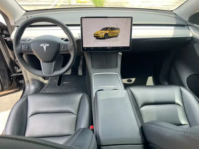 Tesla Model Y — Фото автомобиля 8