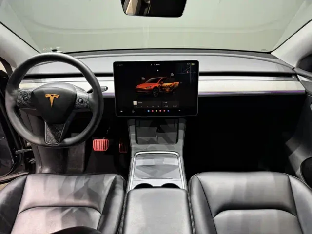 Tesla Model Y — Фото автомобиля 16