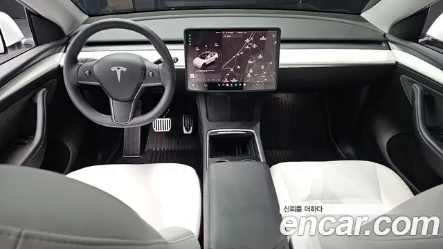 Tesla Model Y — Фото автомобиля 10