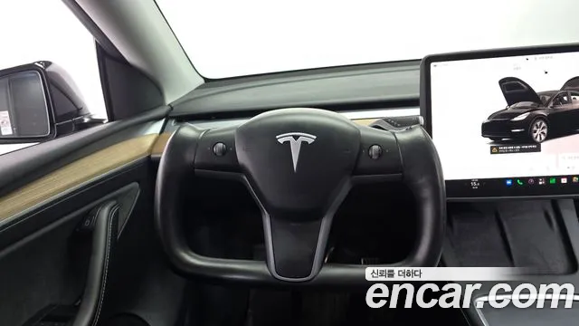 Tesla Model Y — Фото автомобиля 16