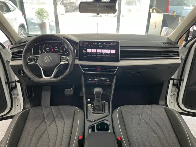 Volkswagen Tiguan L — Фото автомобиля 8