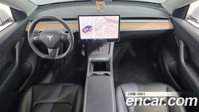 Tesla Model Y — Фото автомобиля 7