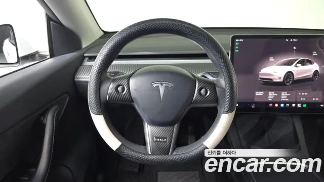 Tesla Model Y — Фото автомобиля 13