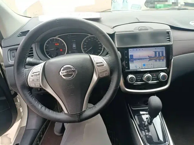 Nissan Tiida — Фото автомобиля 9