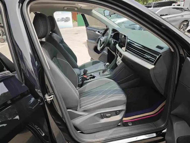Volkswagen Tiguan L — Фото автомобиля 11