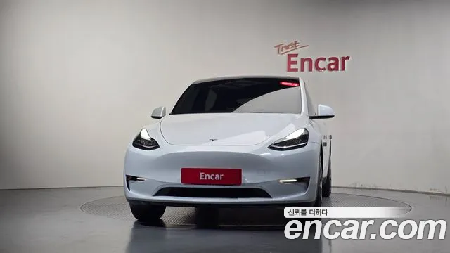 Tesla Model Y — Фото автомобиля 3