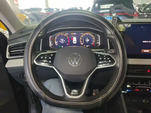 Volkswagen Tiguan L — Фото автомобиля 10