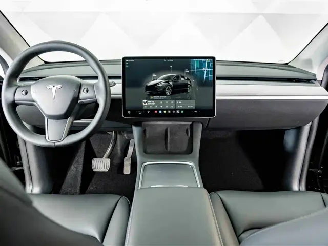 Tesla Model Y — Фото автомобиля 13