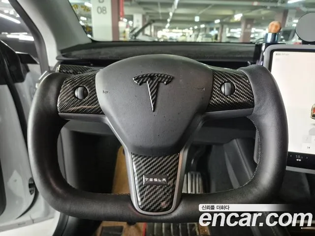 Tesla Model Y — Фото автомобиля 10