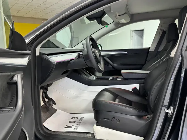 Tesla Model Y — Фото автомобиля 4